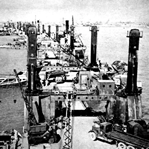 A Busy Wharf at Mulberry Harbour; Second World War, 1944