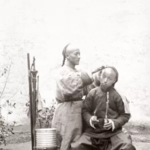 c. 1890 China - Chinese street vendor - barber