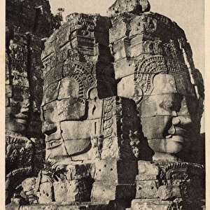 Cambodia - Angkor Wat - Two massive carved heads