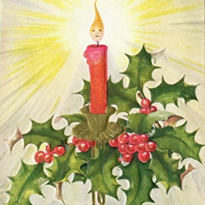 Candle surrounded by holly