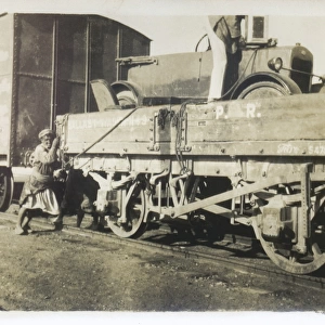 Car being loaded onto a train, Middle East