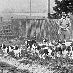 Cecil Aldin with his Basset hounds