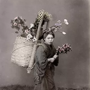 Country woman with basket of flowers, flower vendor, Japan