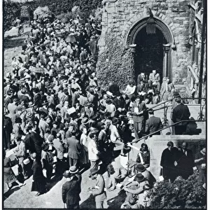 Enemy aliens queue to register outside church, Sept 1939