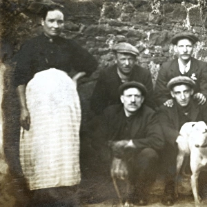 Family group with two dogs