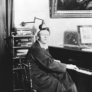 Feodor Chaliapin Seated at his piano, 1913