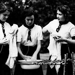 Girl Guides: Princess Elizabeth washing up, 1944