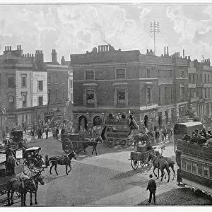 Half a mile away from Westminster, Waterloo and Blackfriars Bridge, situated at the northern end of Walworth Road and the beginning of New Cross Road. The building with a cupola is a station of the South London Electric Railway. Date: 1897