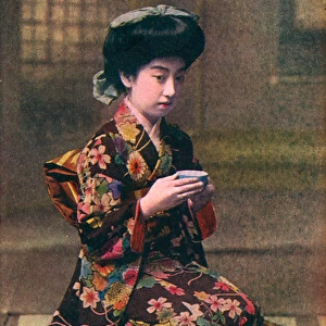 Japanese woman performing the tea ceremony - Japan