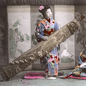 Japanese women - Koto player and woman reading