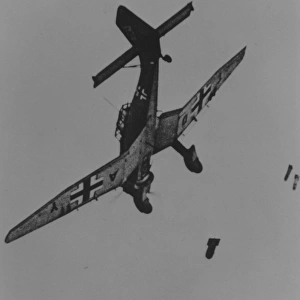 Junkers Ju 87B -releases its bombs from low level with