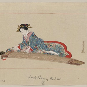 Lady playing the koto