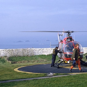 Lighthouse Keepers and Service Helicopter