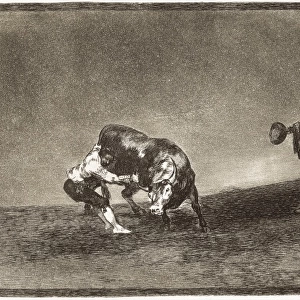 (Martincho, probably Antonio Ebassum) throws a bull in the r