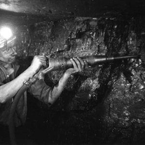 Miner Using Drill / 1956