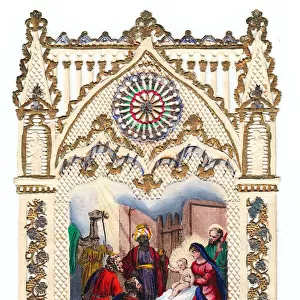 Nativity scene on a paper lace Christmas card