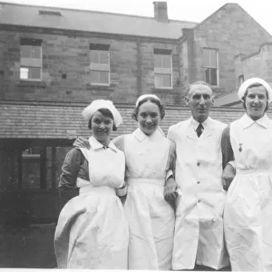 Four nurses and possible male nurse ordoctor