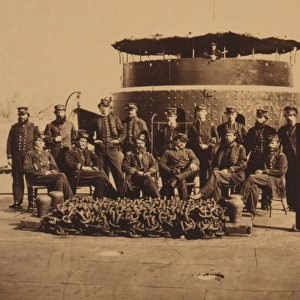 Fifteen officers on deck of a Union monitor warship