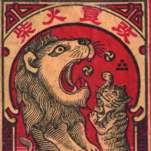Old Japanese Matchbox label of a cat playing with a lion