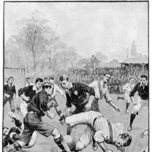 A player falls during a football match