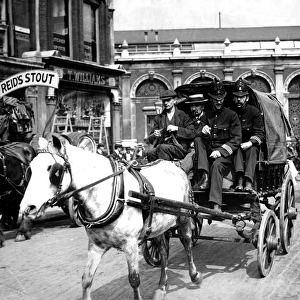 Police escorting cart during Dock Strike, London