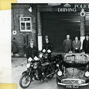 Police officers at Driving School with car and motorcycles