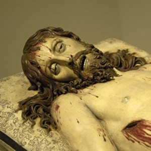 Reclining Christ. Polychrome sculpture by Gregorio