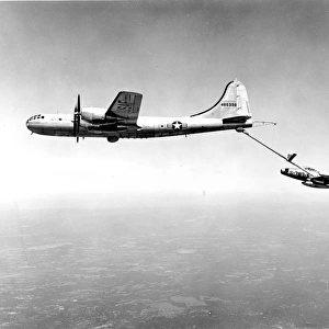 Republic F-84G Thunderjet, 51-767, takes on fuel from a ?