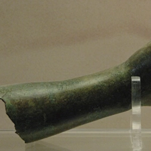 Right forearm belonging to a bronze statue of a woman. 3rd-1