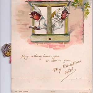 Two robins alarmed by a cat on a Christmas card
