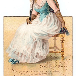 Seated woman with fan on a cutout Christmas card