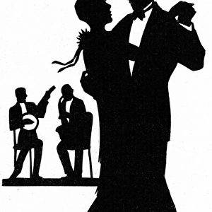 Silhouette of stylish couple dancing