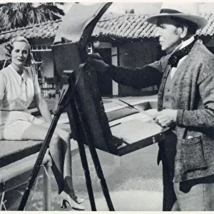 Sir John Lavery at his easel in Palm Springs, painting Doris Delavigne, Lady Castlerosse