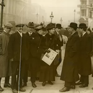 Suffragettes talking to men