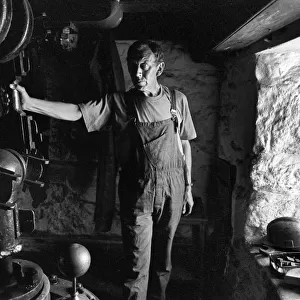Former tin miner in the abandoned Levant tin mine