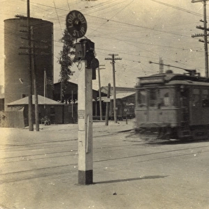 Train passing a railroad crossing, USA