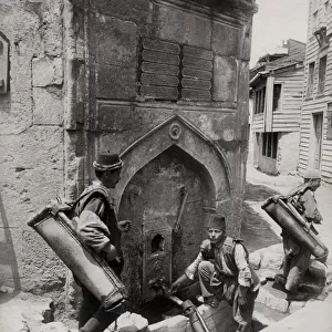 Turkish water carriers filling bags, Constantinople, Istanbu