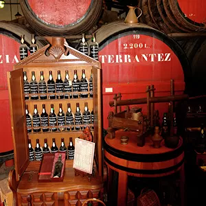 Wine bottles and casks, D Oliveiras Lda, Madeira, Portugal