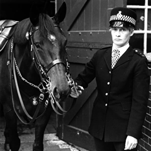 Woman police officer with her horse, London