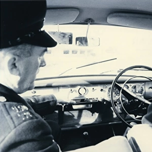 Woman police officer undergoing driving training