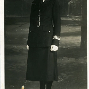 Woman police officer W Gould in uniform, London