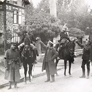 WWI: British soldiers offering cigarettes to French cavalry