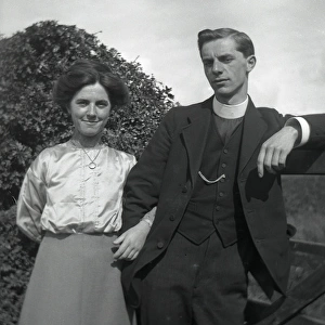 Young clergyman with young woman