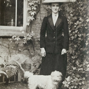 Young Edwardian woman with a dog