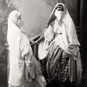 Young veiled North African women, probably Algeria / Tunisia