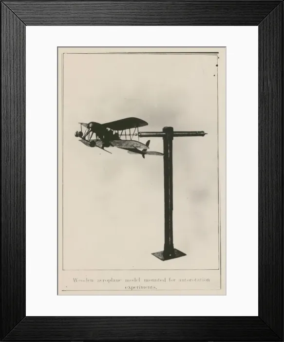 Framed Print : Wooden aeroplane model mounted for autorotation experiment Framed Print : Wooden aeroplane model mounted for autorotation experiment