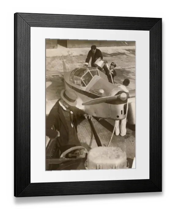 Framed Print : Miles M3 Falcon, G-ACTM, is refuelled at Mildenhall Framed Print : Miles M3 Falcon, G-ACTM, is refuelled at Mildenhall