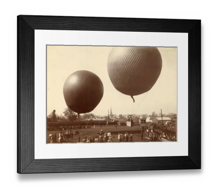 Framed Print : Two balloons alongside a railway station in Monmouth Framed Print : Two balloons alongside a railway station in Monmouth