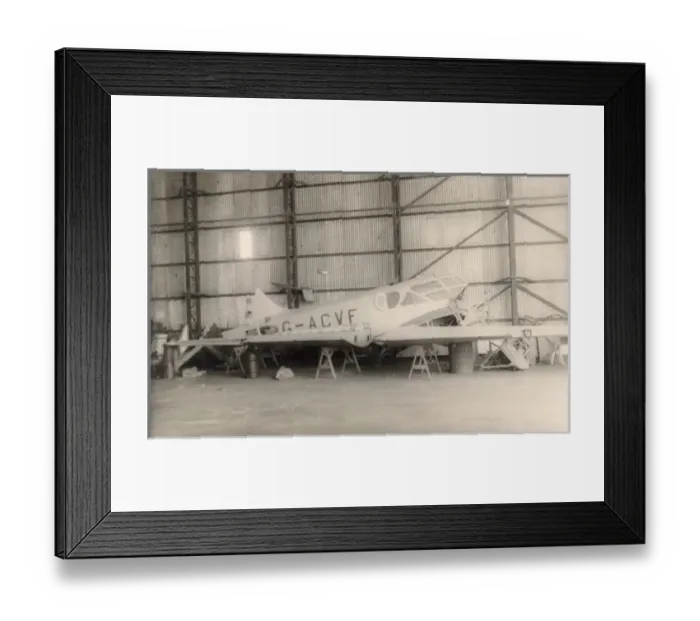 Framed Print : Airspeed AS5 Courier, G-ACVF, during rebuilding Framed Print : Airspeed AS5 Courier, G-ACVF, during rebuilding