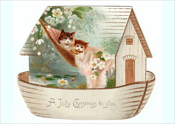 Two cats on a cutout Christmas card